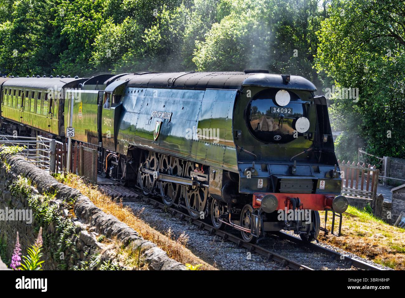 British Railways Bullied West Country Pacific 4-6-2 N. 34092 City of Wells seen at the East Lancashire railway  station of Irwell Vale Halt. Lancashir Stock Photo