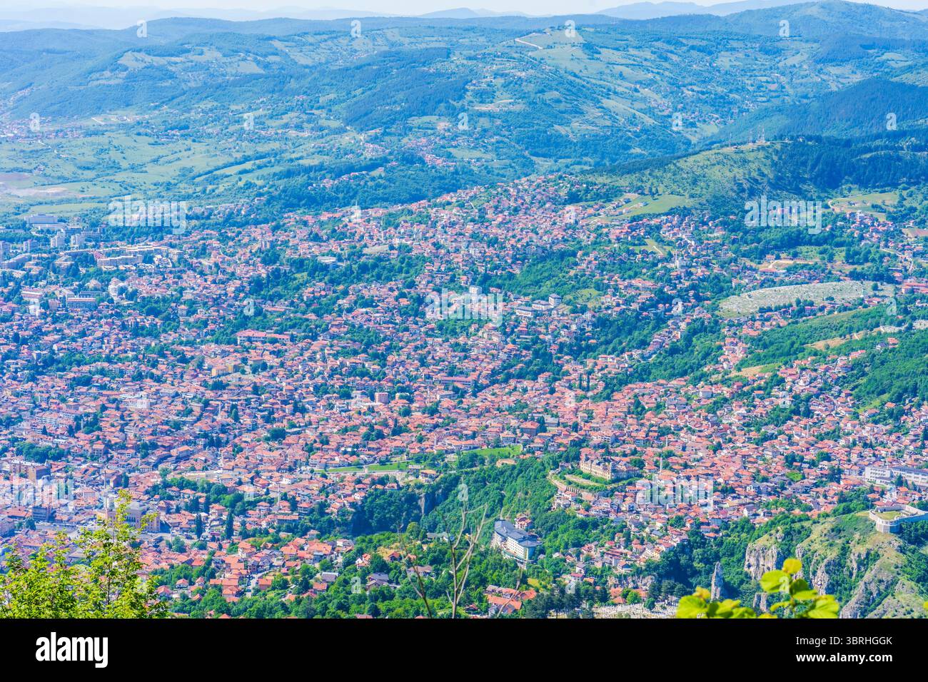 Aerial view of Sarajevo and surrounding Dinaric Alps from Mount ...