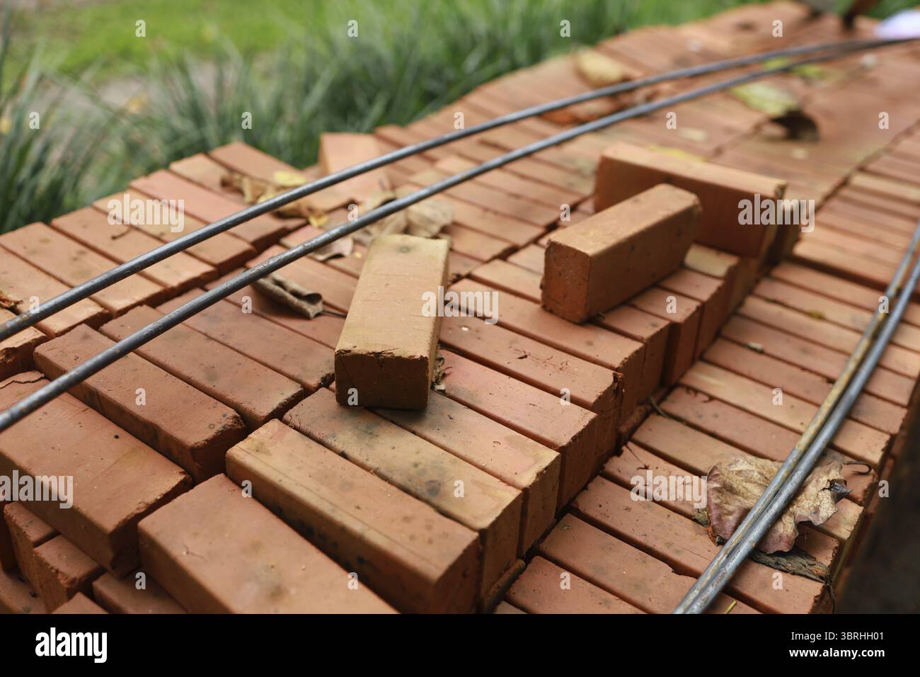 Pallet a red brick building material stack of new red bricks for construction Stock Photo