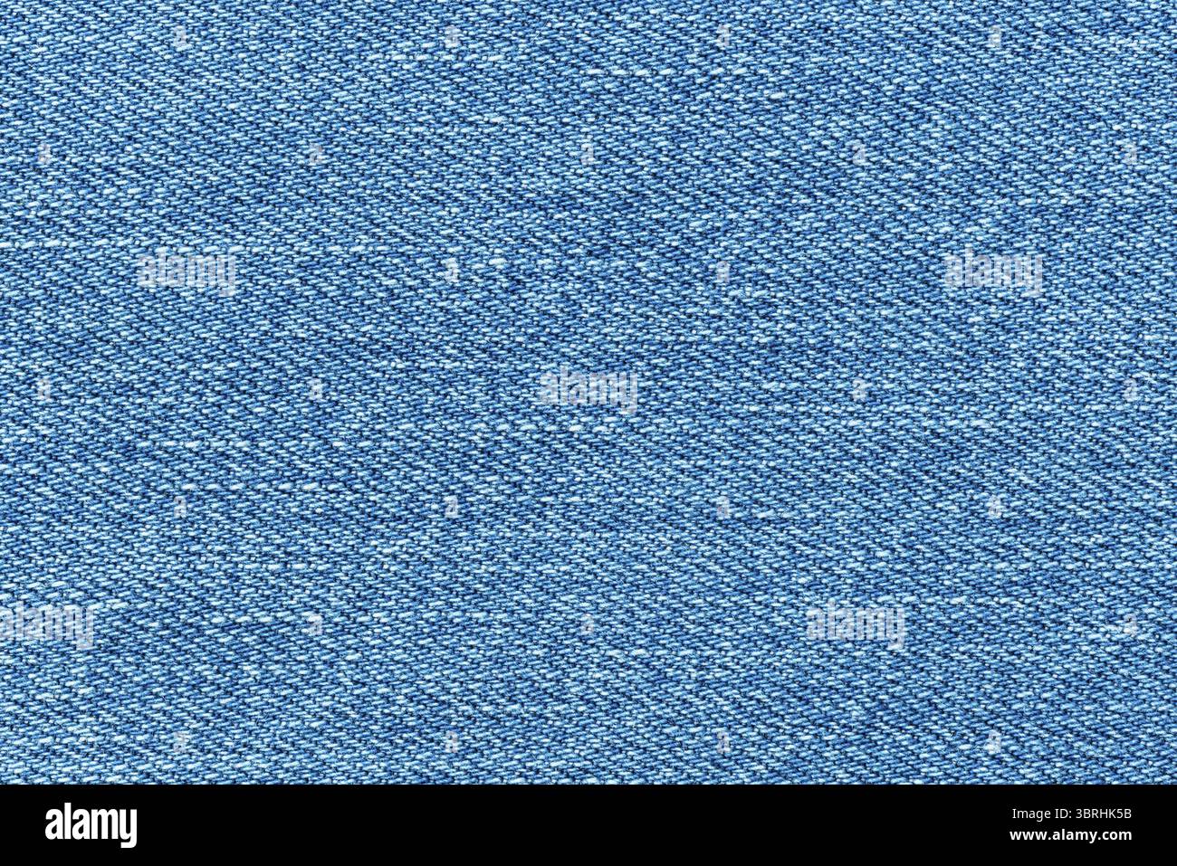 Texture of blue jeans denim background. Canvas blue denim. Top view closeup of grunge blue jeans denim Stock Photo