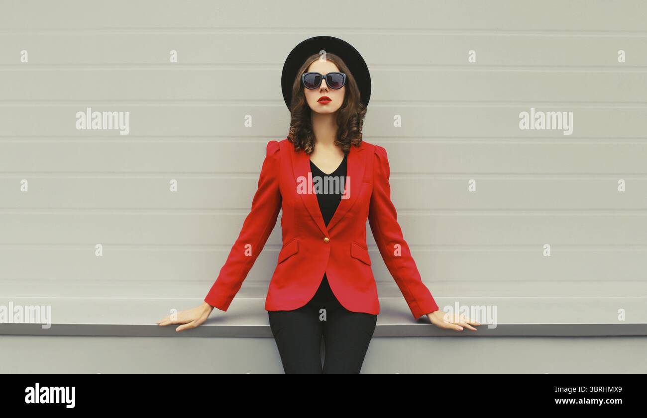 Businesswoman in black blazer hi-res stock photography and images - Alamy