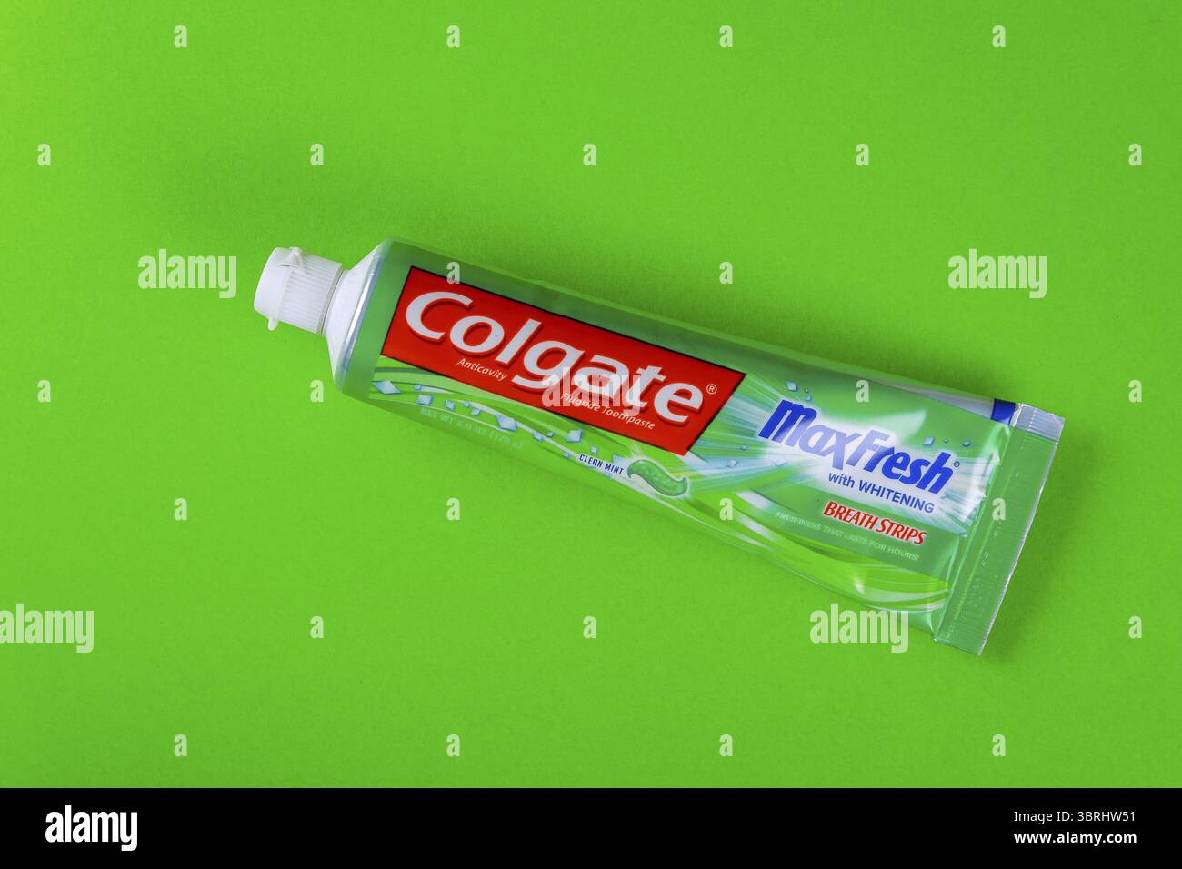 New York NY NOV 29 2019: Colgate toothpaste isolated on green ...