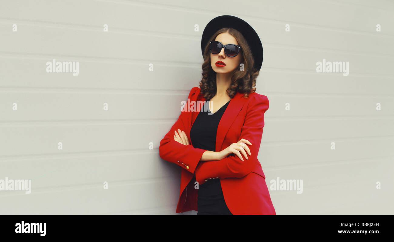 Businesswoman in black blazer hi-res stock photography and images - Alamy