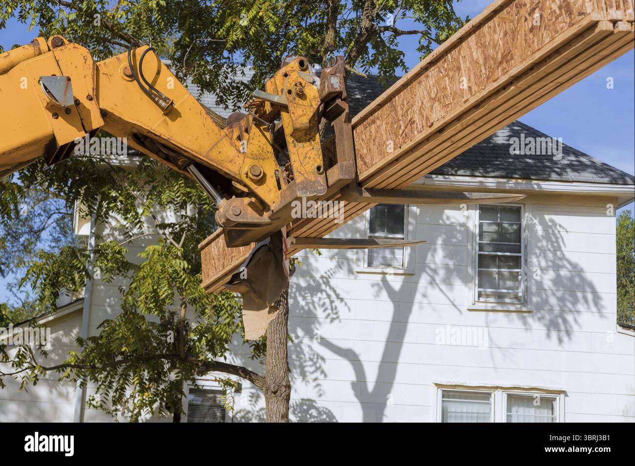Forklift stacker loader construction showing joists trusses wooden ...