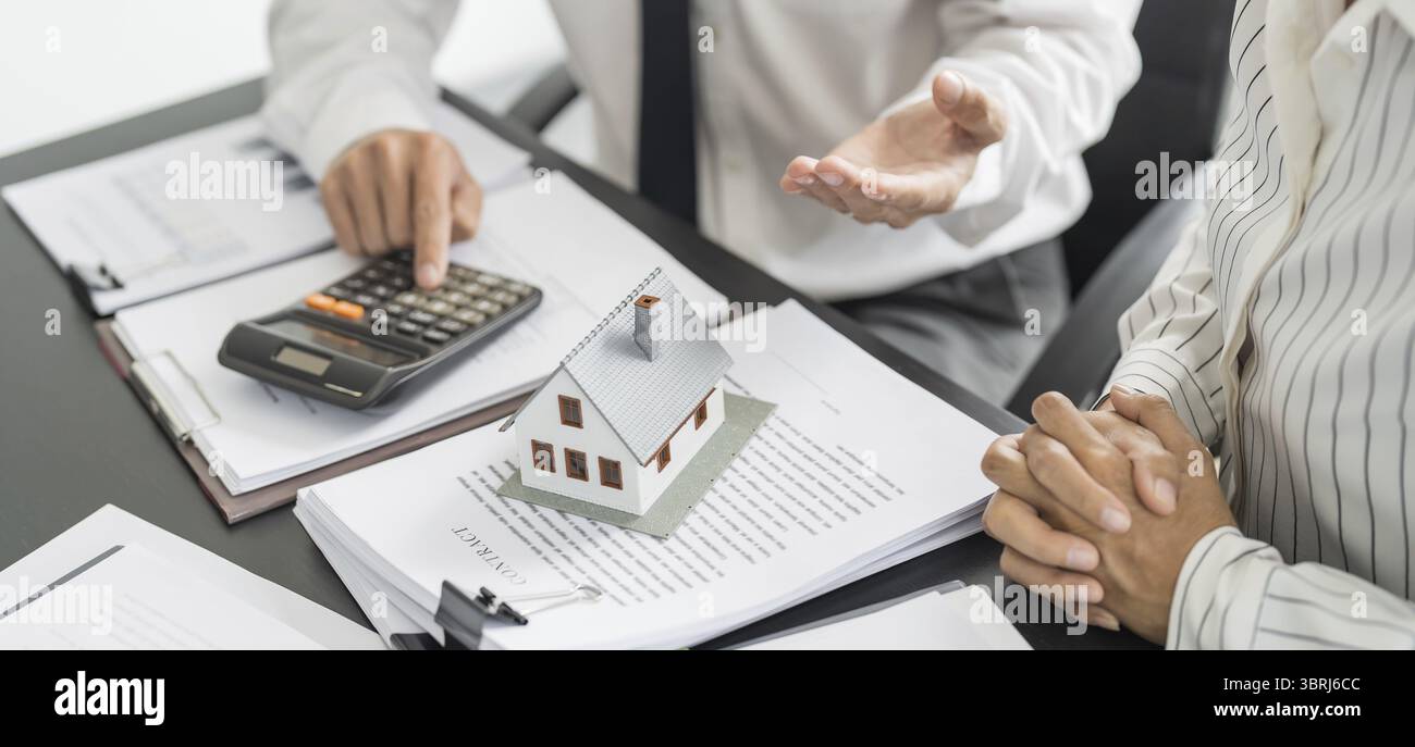 Real estate investment Property insurance and security. Real estate agent offer house Stock Photo