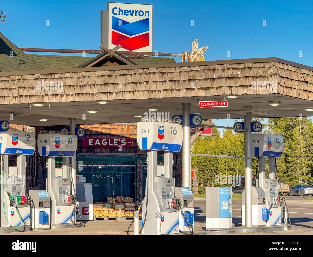 West Yellowstone, Montana, USA - 29 May 2025: Gas station operated by Chevron in the small town of West Yellowstone. - Smartphone Captured Stock Image West Yellowstone, Montana, USA - 29 May 2025: Gas station operated by Chevron in the small town of West Yellowstone. - Smartphone Captured Stock Image