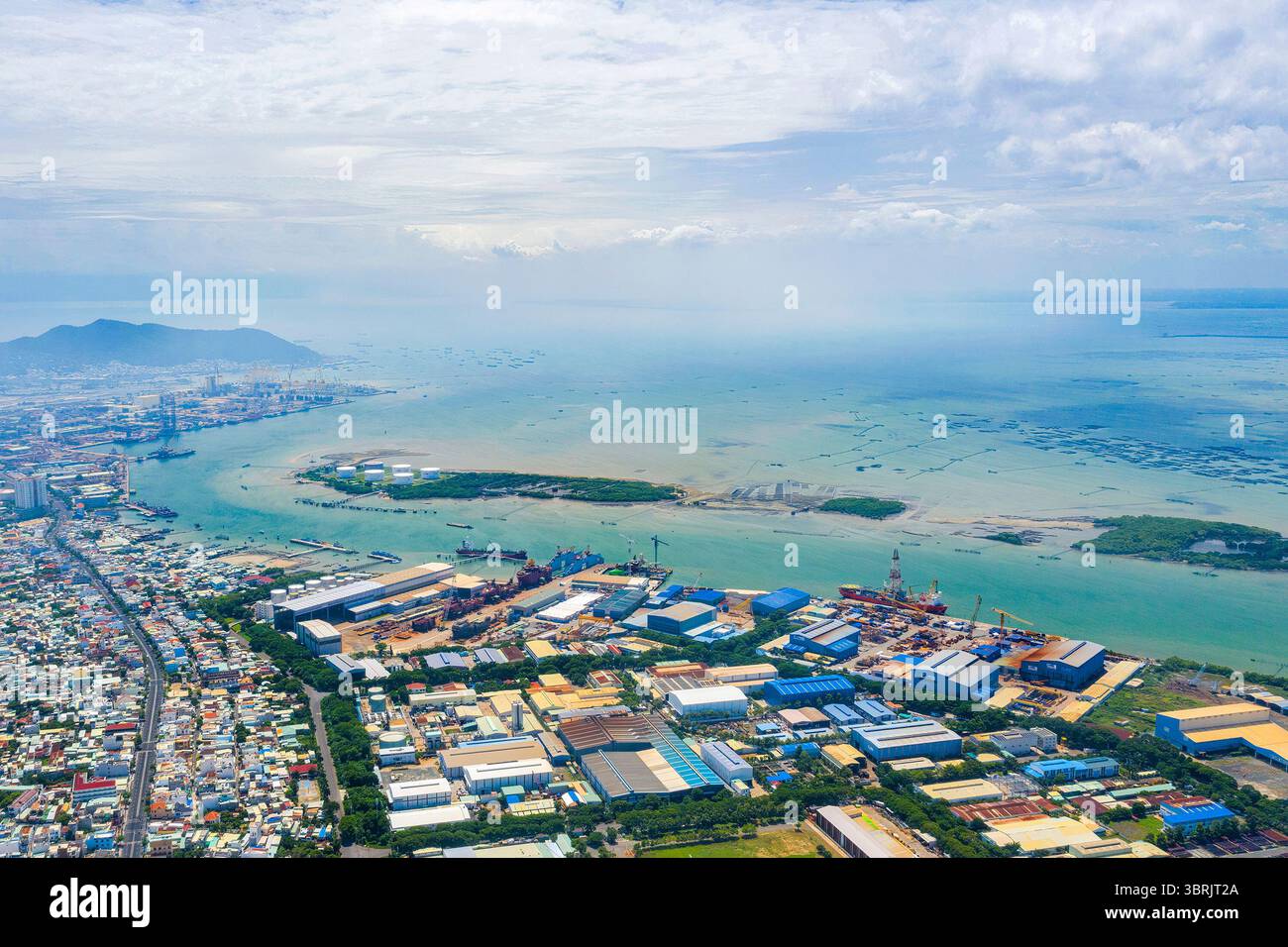 A corner of Vung Tau city with industrial parks and port clusters on Ganh Rai bay Stock Photo