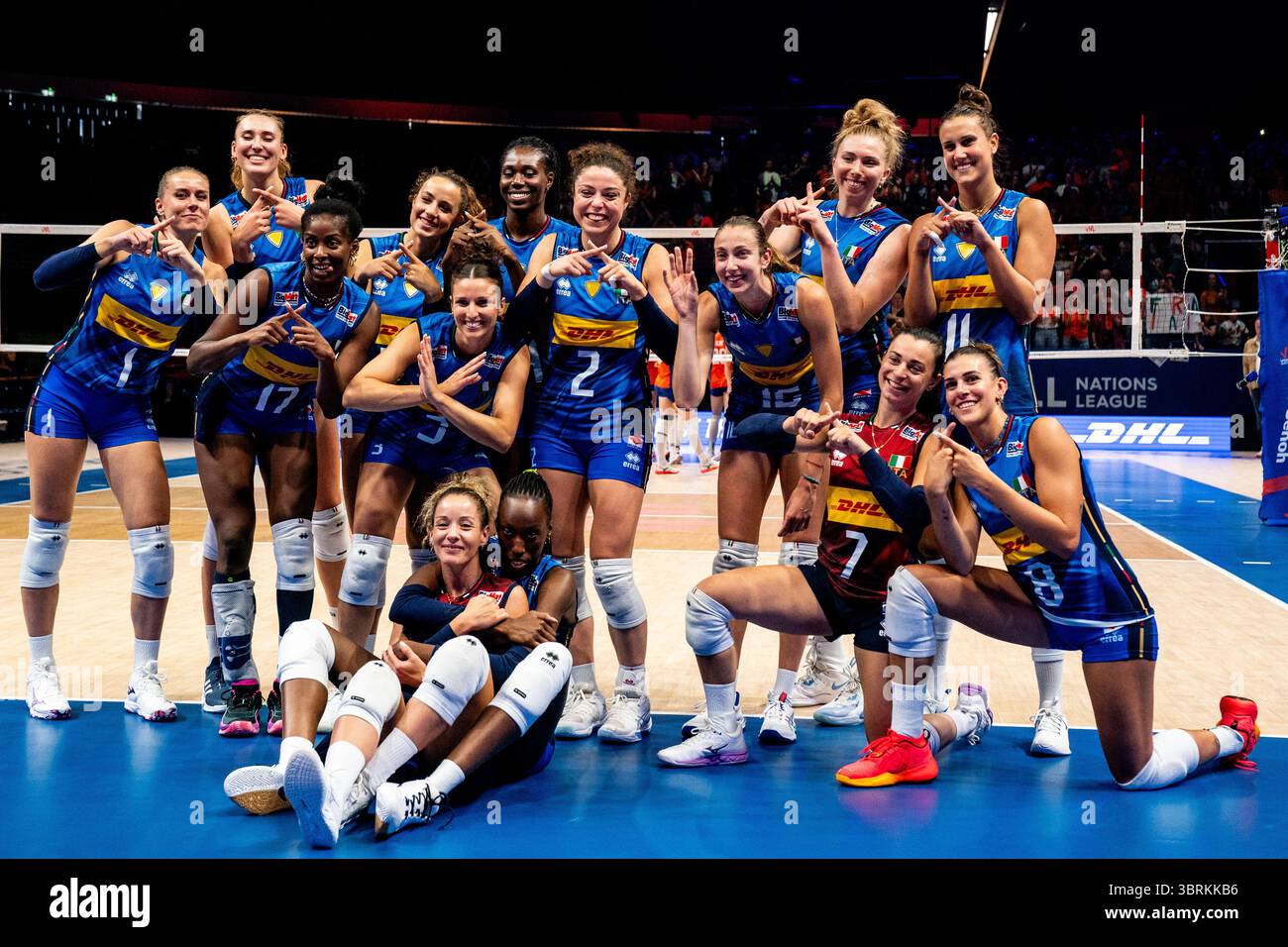 APELDOORN, NETHERLANDS - JULY 13: Anna Gray of Italy, Ekaterina Antropova of Italy, Alice Carlotta Degradi of Italy, Carlotta Cambi of Italy, Monica De Gennaro of Italy, Eleonora Fersino of Italy, Alessia Orro of Italy, Anna Danesi of Italy, Linda Nwakalor of Italy, Stella Nervini of Italy, Myriam Fatime Sylla of Italy, Paola Ogechi Egonu of Italy, Sarah Luisa Fahr of Italy and Gaia Giovannini of Italy celebrate their team’s win during the Women's 2025 Volleyball Nations League - Apeldoorn match between Netherlands and Italy at the Omnisport on July 13, 2025 in Apeldoorn, Netherlands. (Photo b Stock Photo