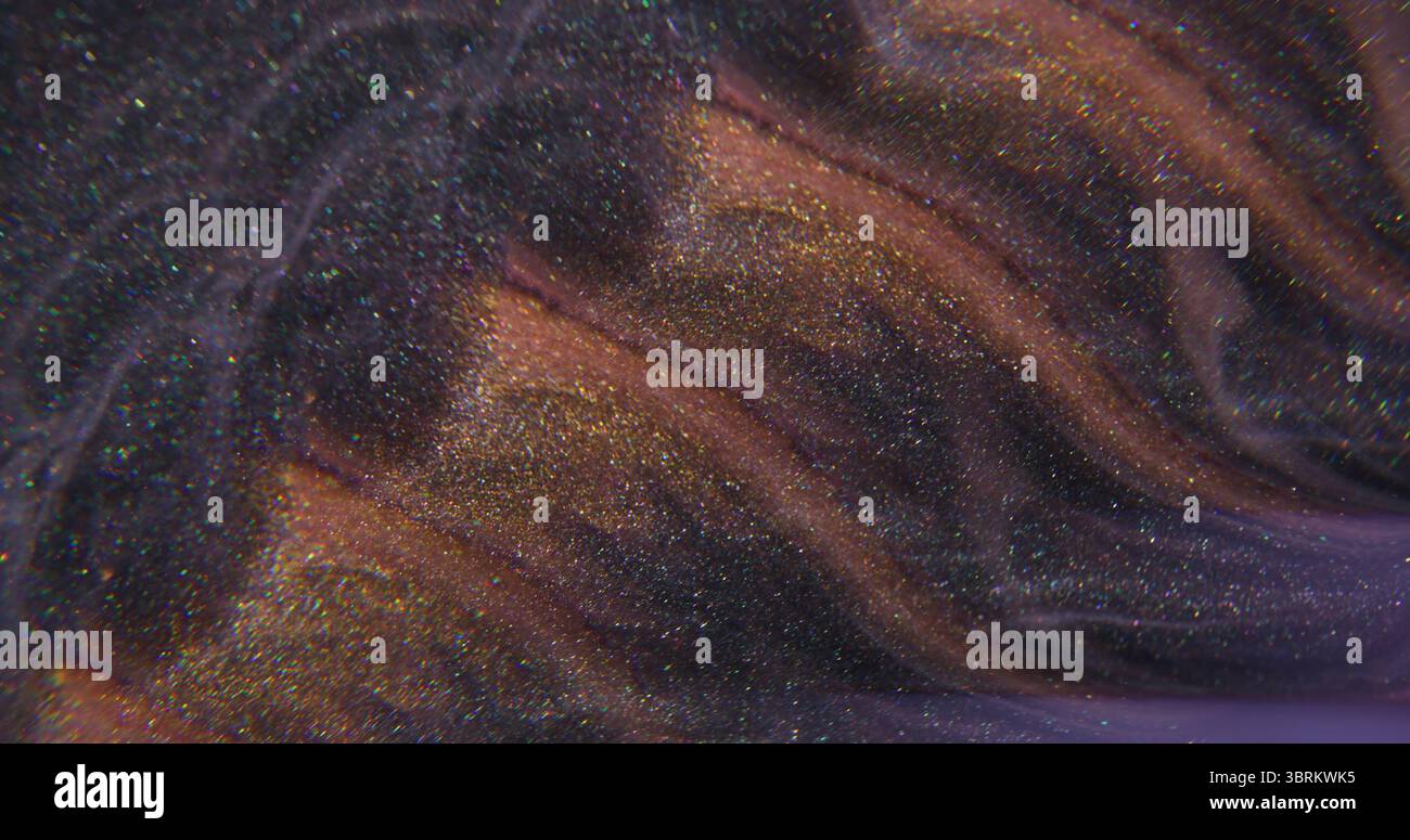 Sparkling texture. Splash liquid. Defocused golden purple color paint ...