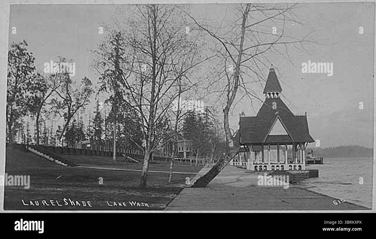 Madison Park with view north along the sidewalk toward a bathing pavilion on Lake Washington, Seattle, probably between 1890 and (WARNER 14). Stock Photo