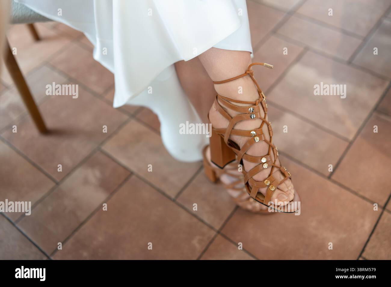 Gold strappy heels hi-res stock photography and images - Alamy