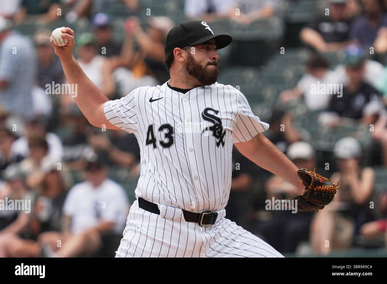 Chicago White Sox starting pitcher Aaron Civale throws against the