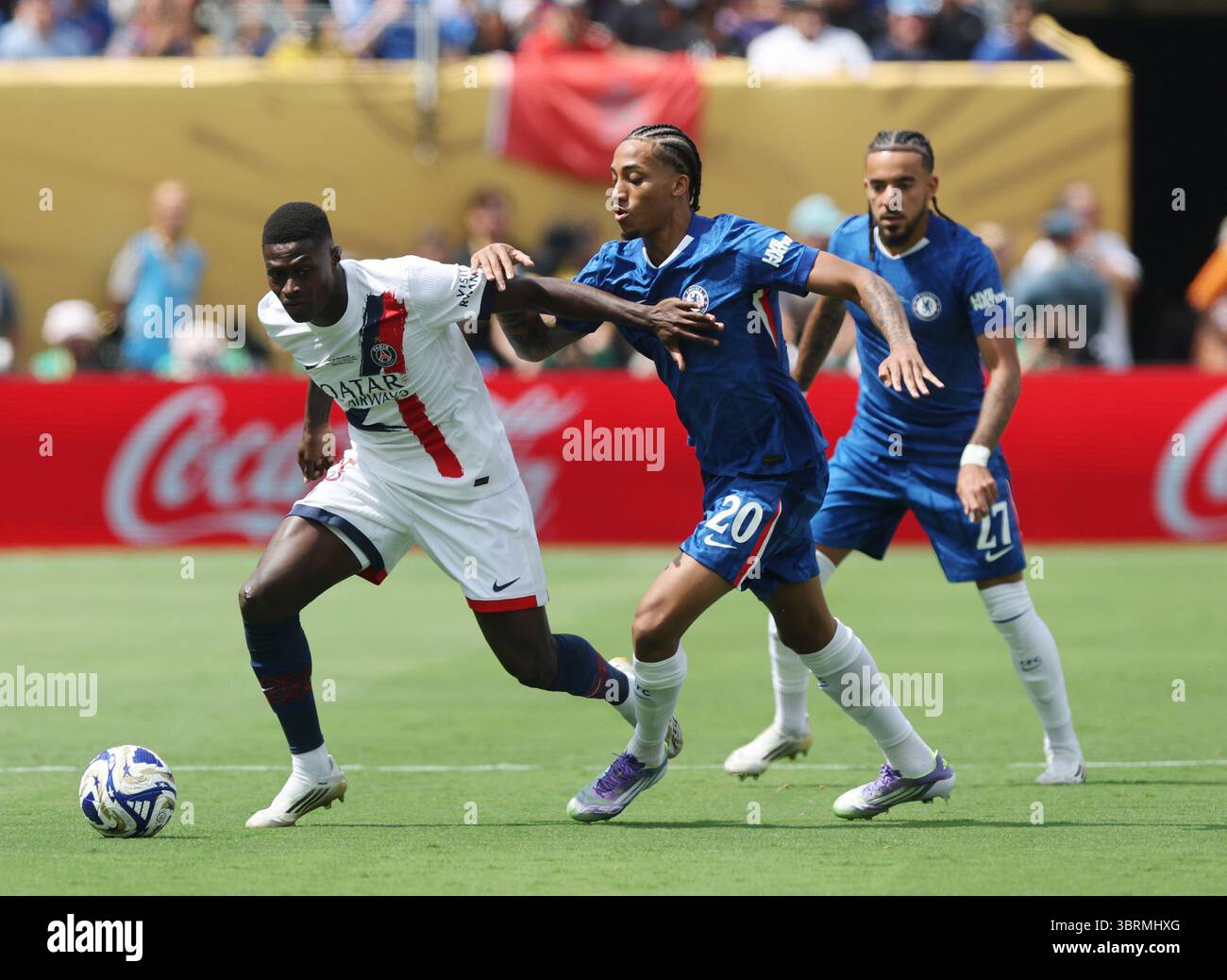 New Jersey, USA. 13th July, 2025. Nuno Mendes of Paris St Germain (l) tussles with Joao Pedro of Chelsea (r) during the Chelsea vs Paris Saint Germain FIFA Club World Cup Final match at Metlife Stadium, New Jersey. Picture credit should read: David Klein/Sportimage Credit: Sportimage Ltd/Alamy Live News Stock Photo