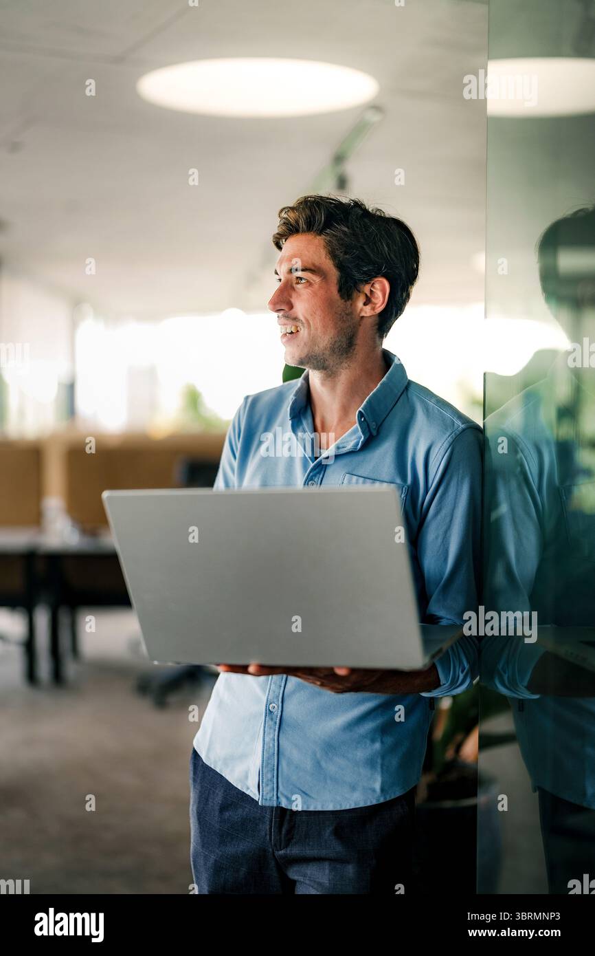 Software engineer using laptop computer with global network connection, Technology, innovation Stock Photo