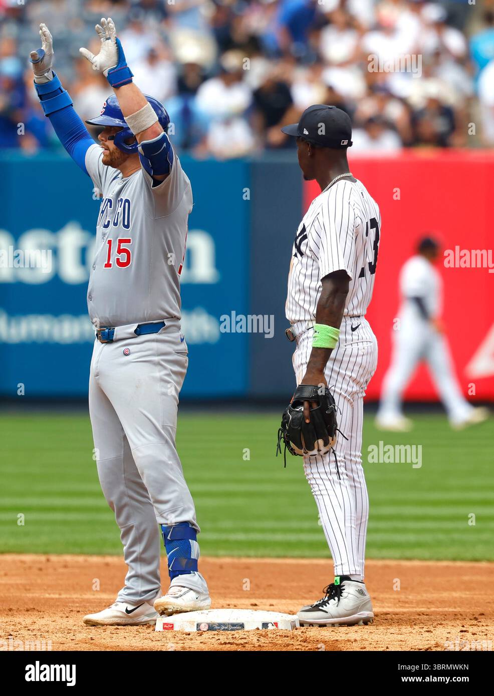 Chicago Cubs' Carson Kelly (15) reacts after hitting a double during ...