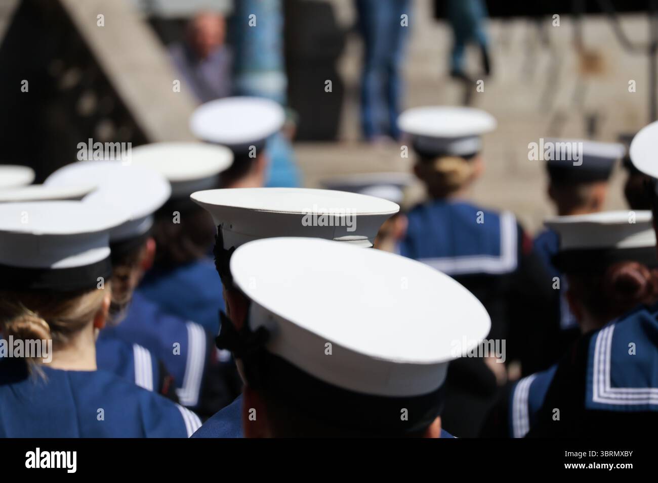 Navy sailors in uniform with their backs to camera Uniformed Heads and ...