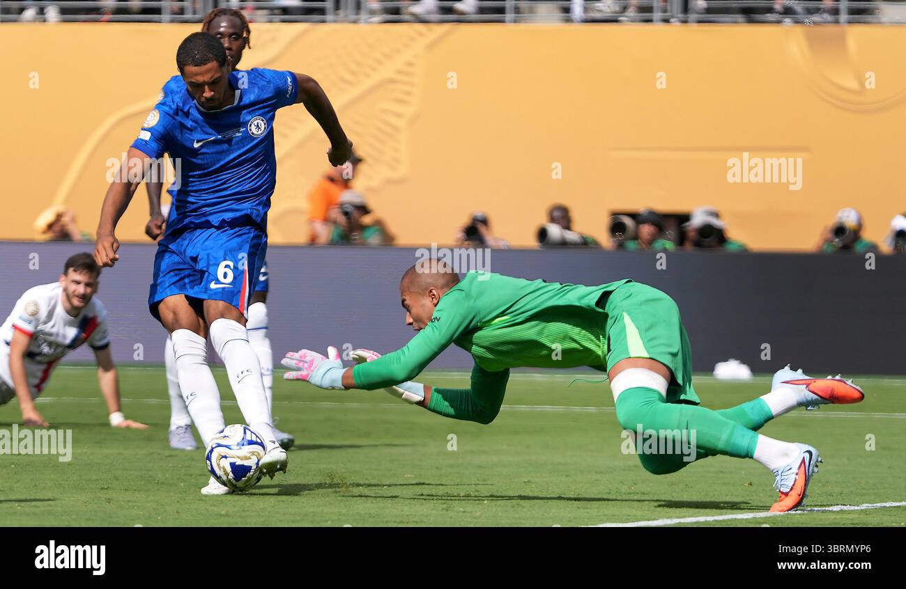 Chelsea's Levi Colwill clears the ball as goalkeeper Robert Sanchez ...