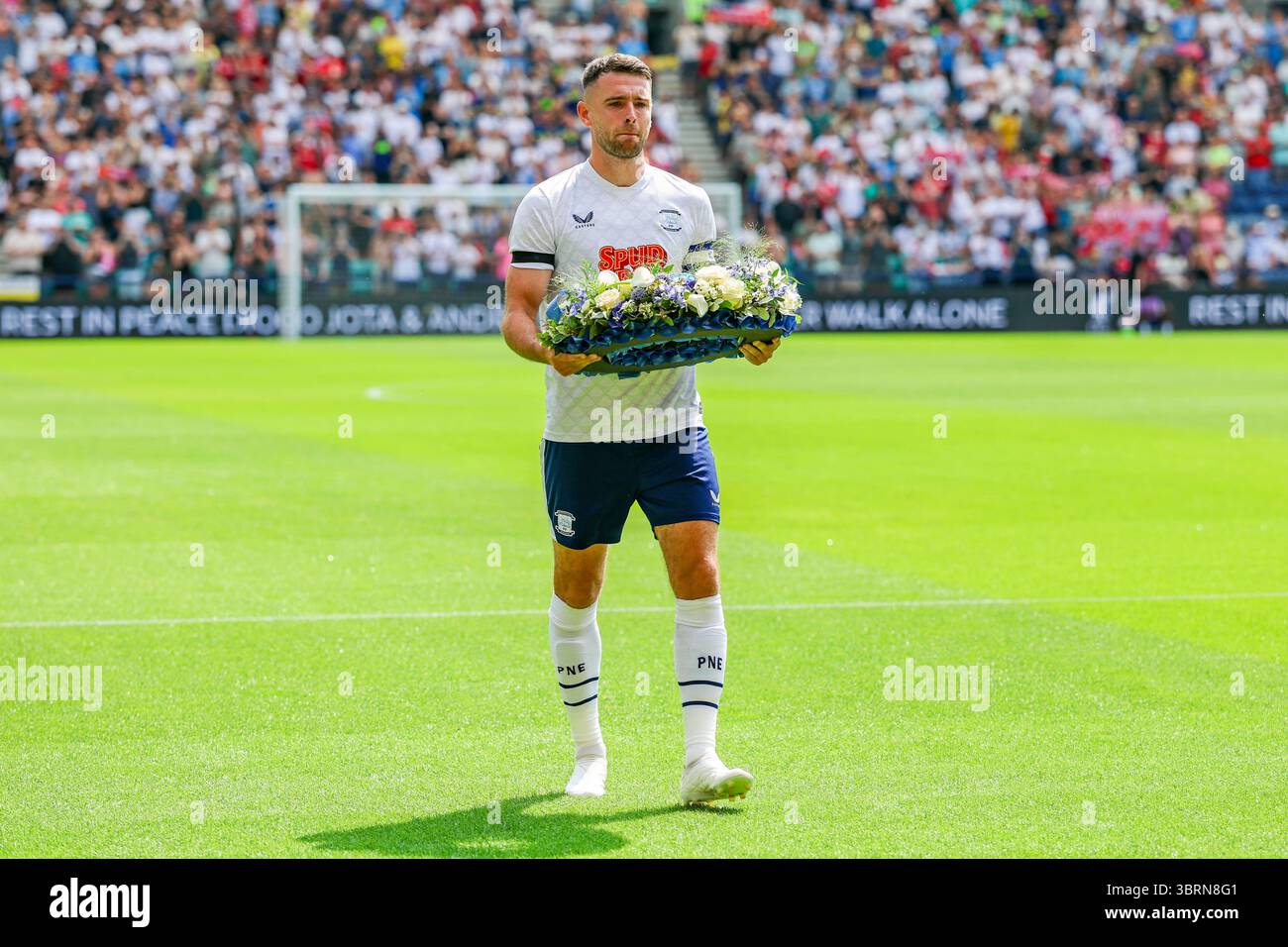 Preston, UK. 13th July, 2025. Ben Whiteman lays a wreath in front of ...
