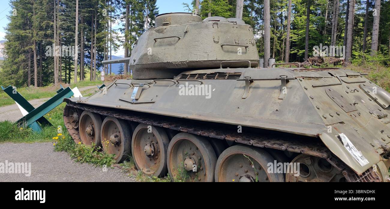 Old Soviet-made tank T-34-85, on the Road 109, leading toward the Slovenian border, near Arnoldstein, Austria Stock Photo
