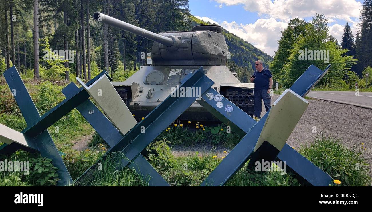 Old Soviet-made tank T-34-85, on the Road 109, leading toward the Slovenian border, near Arnoldstein, Austria Stock Photo