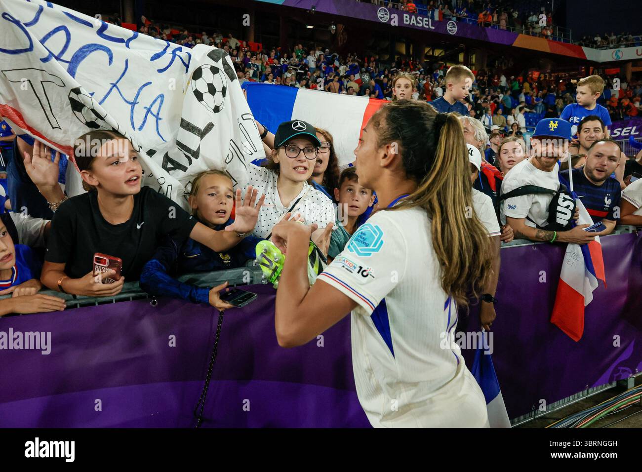 13th July 2025, St. Jakob-Park: Selma Bacha (13 France) gives her shoes ...