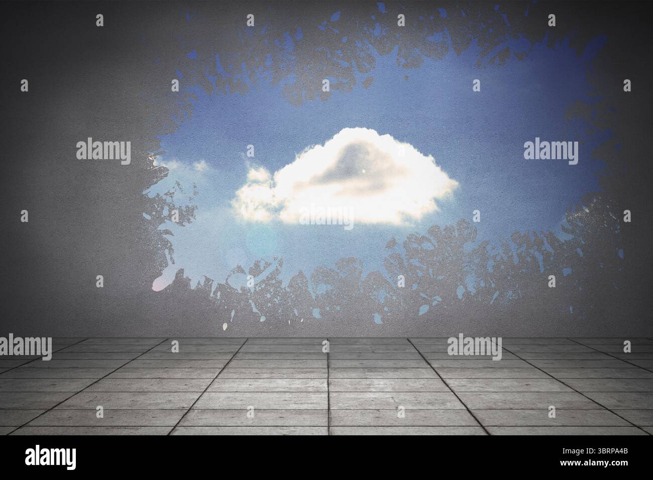 Splash on wall revealing cloud in sky Stock Photo