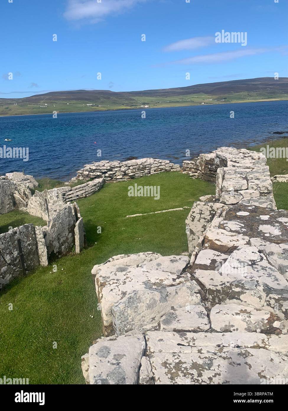 The Broch of Gurness Scotland Orkneys Orkney sand sea ancient village Iron age buildings people historic history building hidden found landscape shore - Smartphone Captured Stock Image