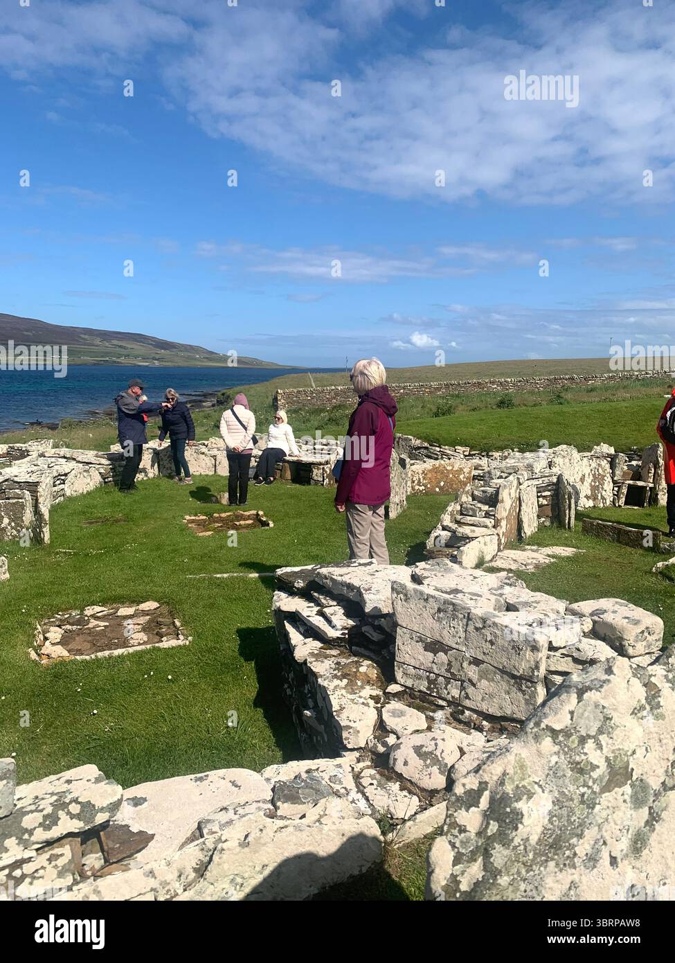 Iron age village houses Scotland Orkney Orkneys Broch of Gurness home homes stone walls thick North Sea land people lived life BC BBC - Smartphone Captured Stock Image