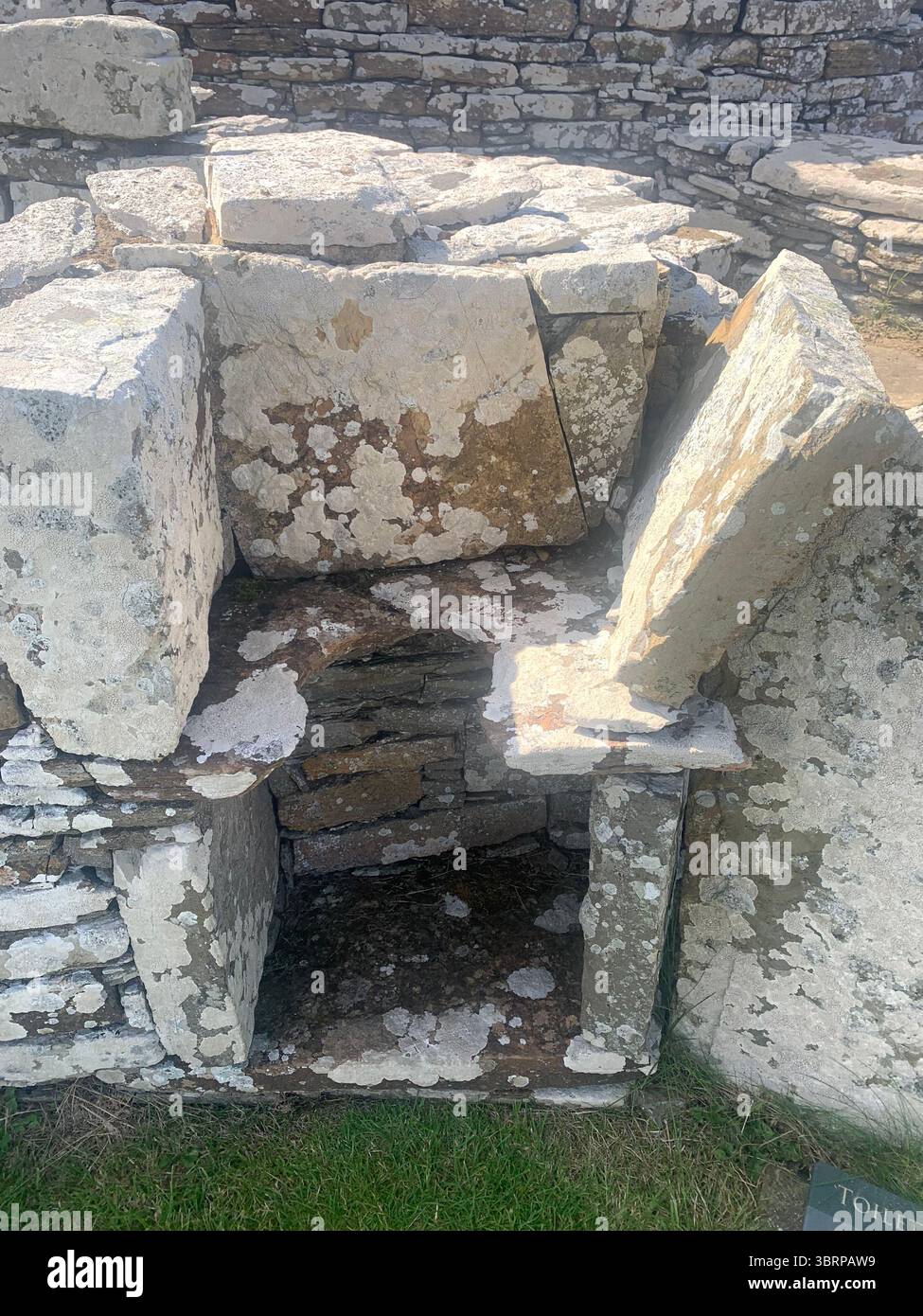Iron age village houses Scotland Orkney Orkneys Broch of Gurness home homes stone walls thick North Sea land people lived life BC BBC - Smartphone Captured Stock Image