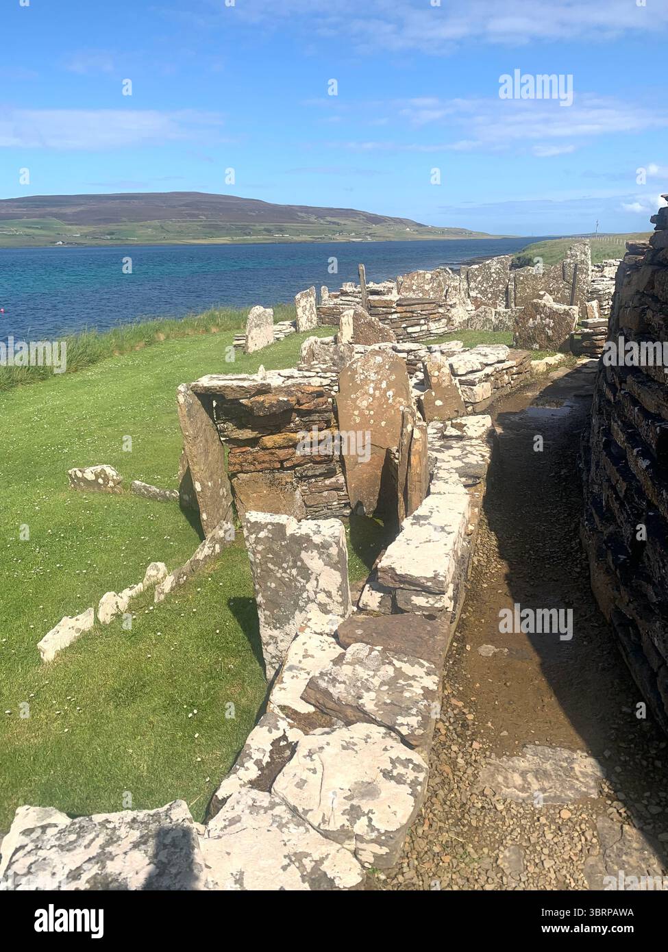 Iron age village houses Scotland Orkney Orkneys Broch of Gurness home homes stone walls thick North Sea land people lived life BC BBC - Smartphone Captured Stock Image