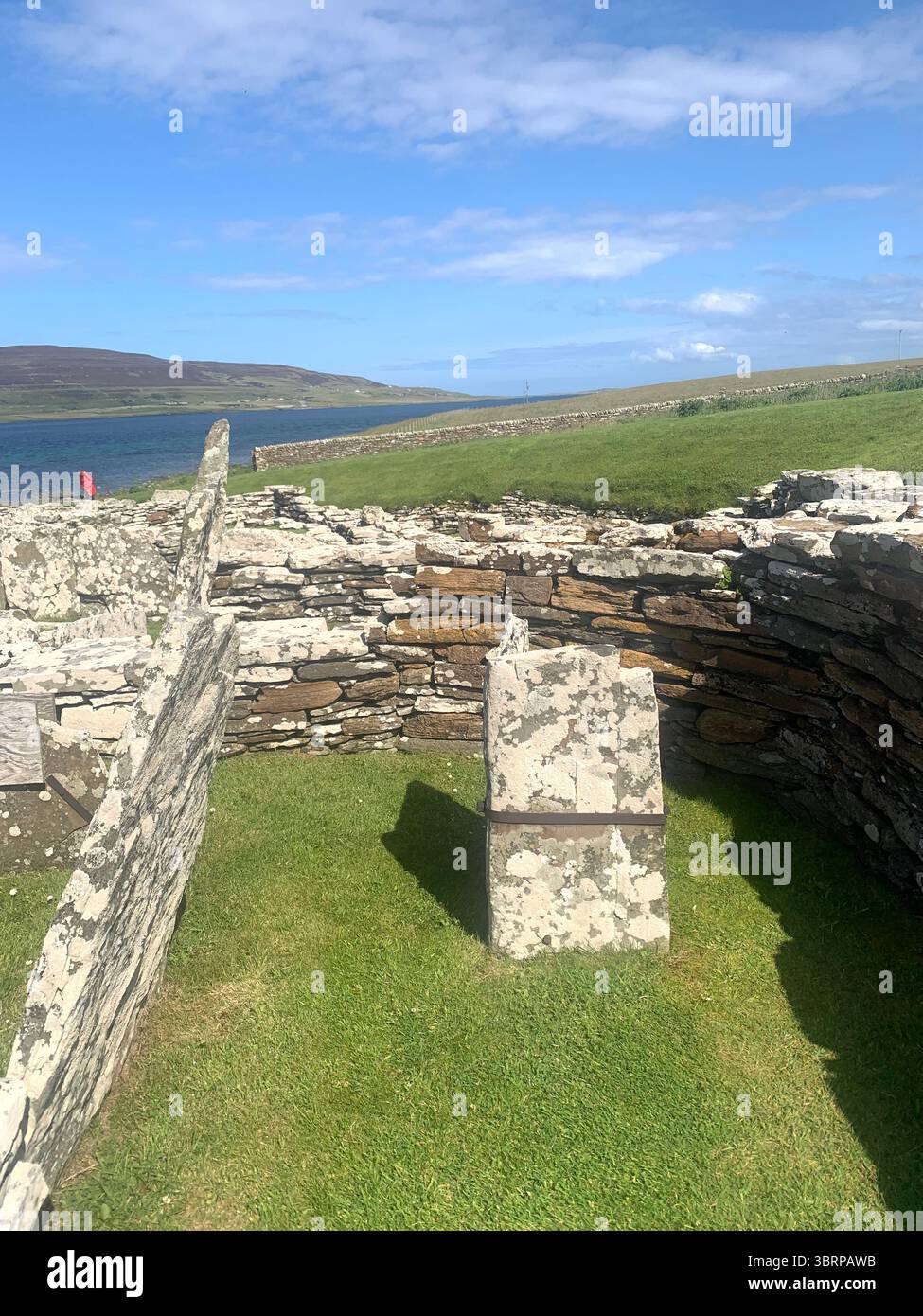 Iron age village houses Scotland Orkney Orkneys Broch of Gurness home homes stone walls thick North Sea land people lived life BC BBC - Smartphone Captured Stock Image