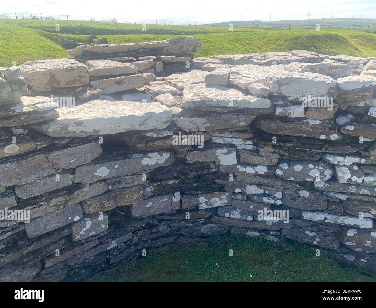 Iron age village houses Scotland Orkney Orkneys Broch of Gurness home homes stone walls thick North Sea land people lived life BC BBC - Smartphone Captured Stock Image