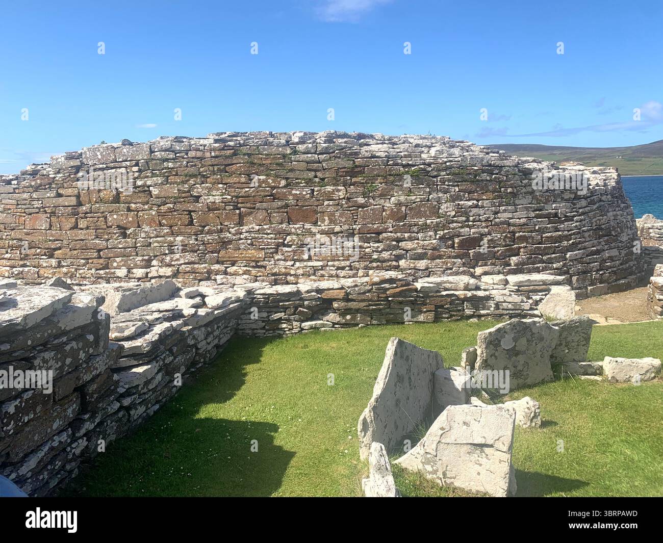 Iron age village houses Scotland Orkney Orkneys Broch of Gurness home homes stone walls thick North Sea land people lived life BC BBC - Smartphone Captured Stock Image