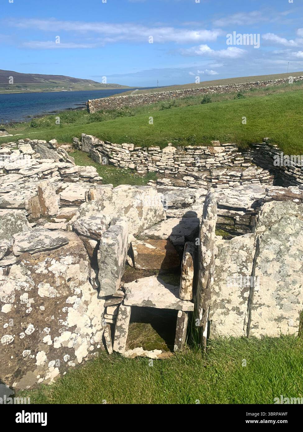 Iron age village houses Scotland Orkney Orkneys Broch of Gurness home homes stone walls thick North Sea land people lived life BC BBC - Smartphone Captured Stock Image