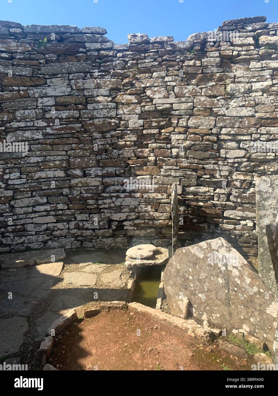 The Broch of Gurness Scotland Orkneys sand ancient village Iron age people Historic history buildings building hidden found landscape shore sea - Smartphone Captured Stock Image