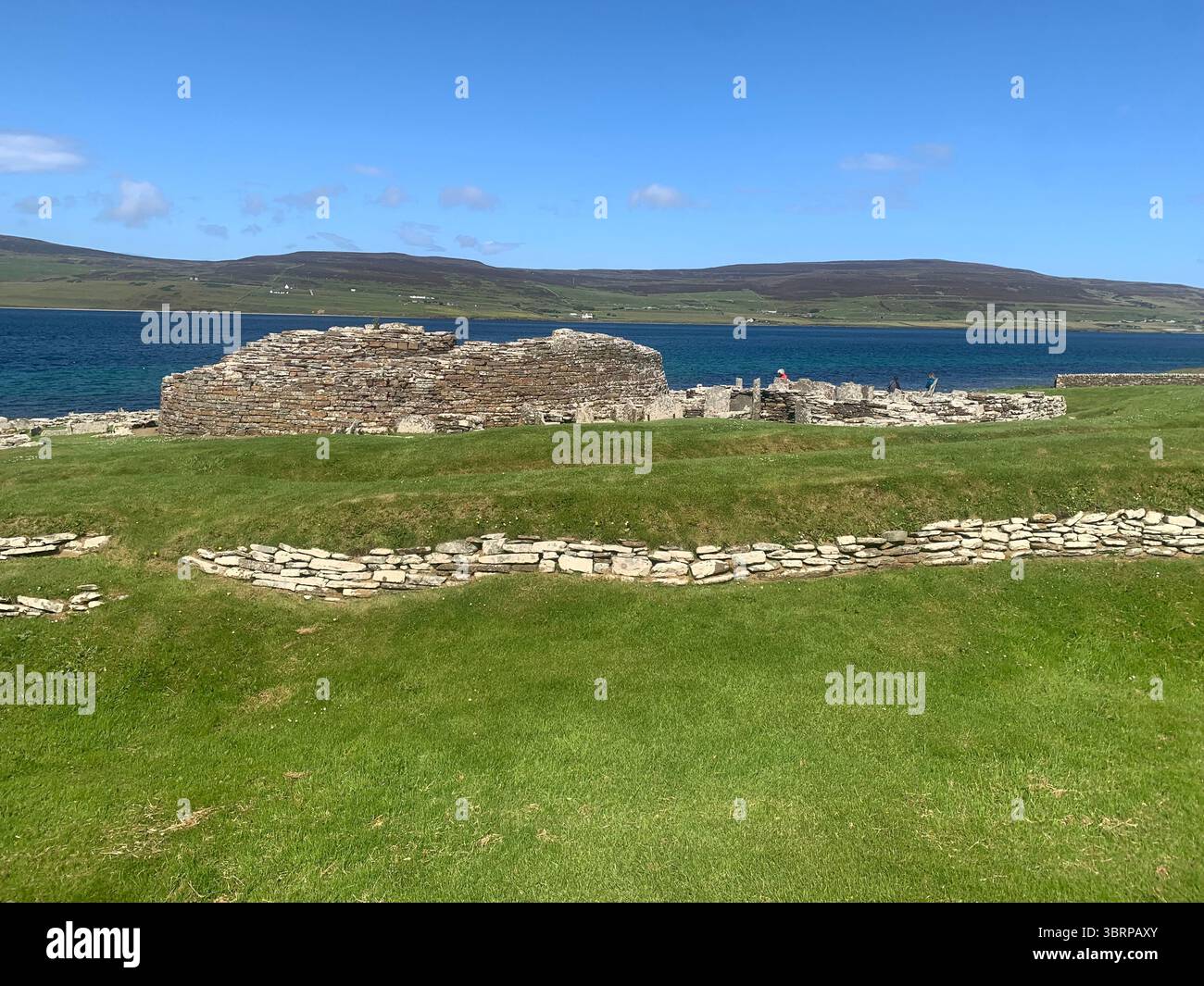 The Broch of Gurness Scotland Orkneys sand ancient village Iron age people Historic history buildings building hidden found landscape shore sea - Smartphone Captured Stock Image
