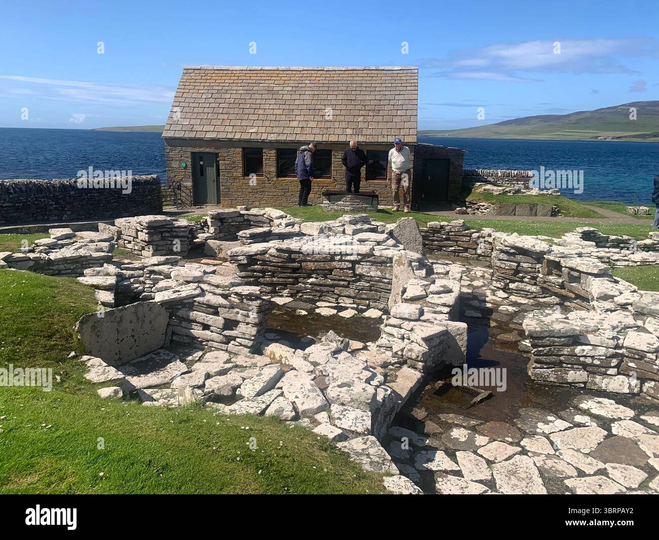 The Broch of Gurness Scotland Orkneys sand ancient village Iron age people Historic history buildings building hidden found landscape shore sea - Smartphone Captured Stock Image