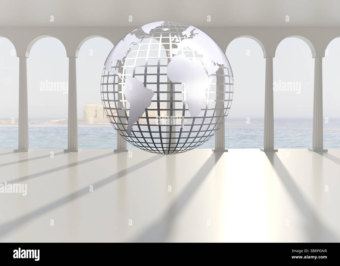 Silver globe floating in room Stock Photo