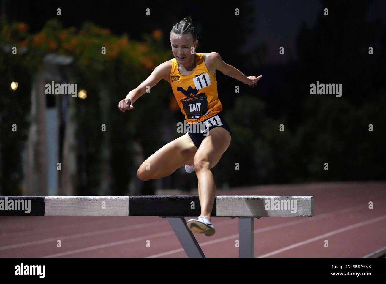 Sarah Tait of West Virginia places second in the women's steeplechase ...