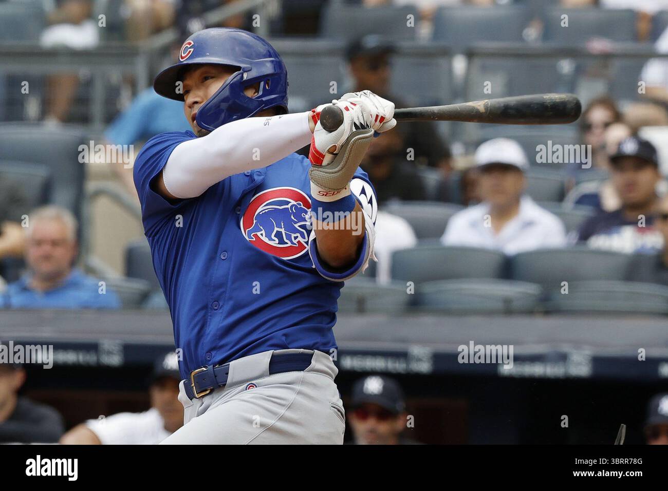 Seiya Suzuki of the Chicago Cubs hits a double in the third inning of a