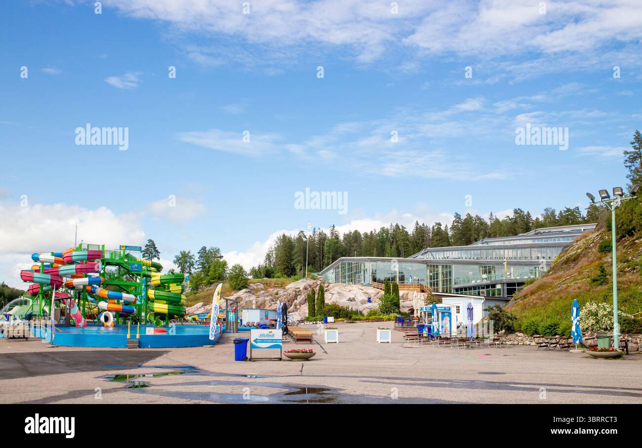 Espoo, Tornimäentie, Finland-08JUL2025-Outdoor view of Serena Water Park in Finland. Main building and colorful water slides. Stock Photo