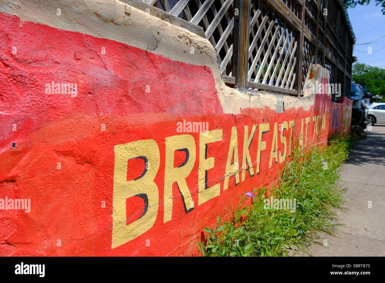 27 MAY 2025 - Austin, TX, USA - A breakfast sign painted on a cafe in ...