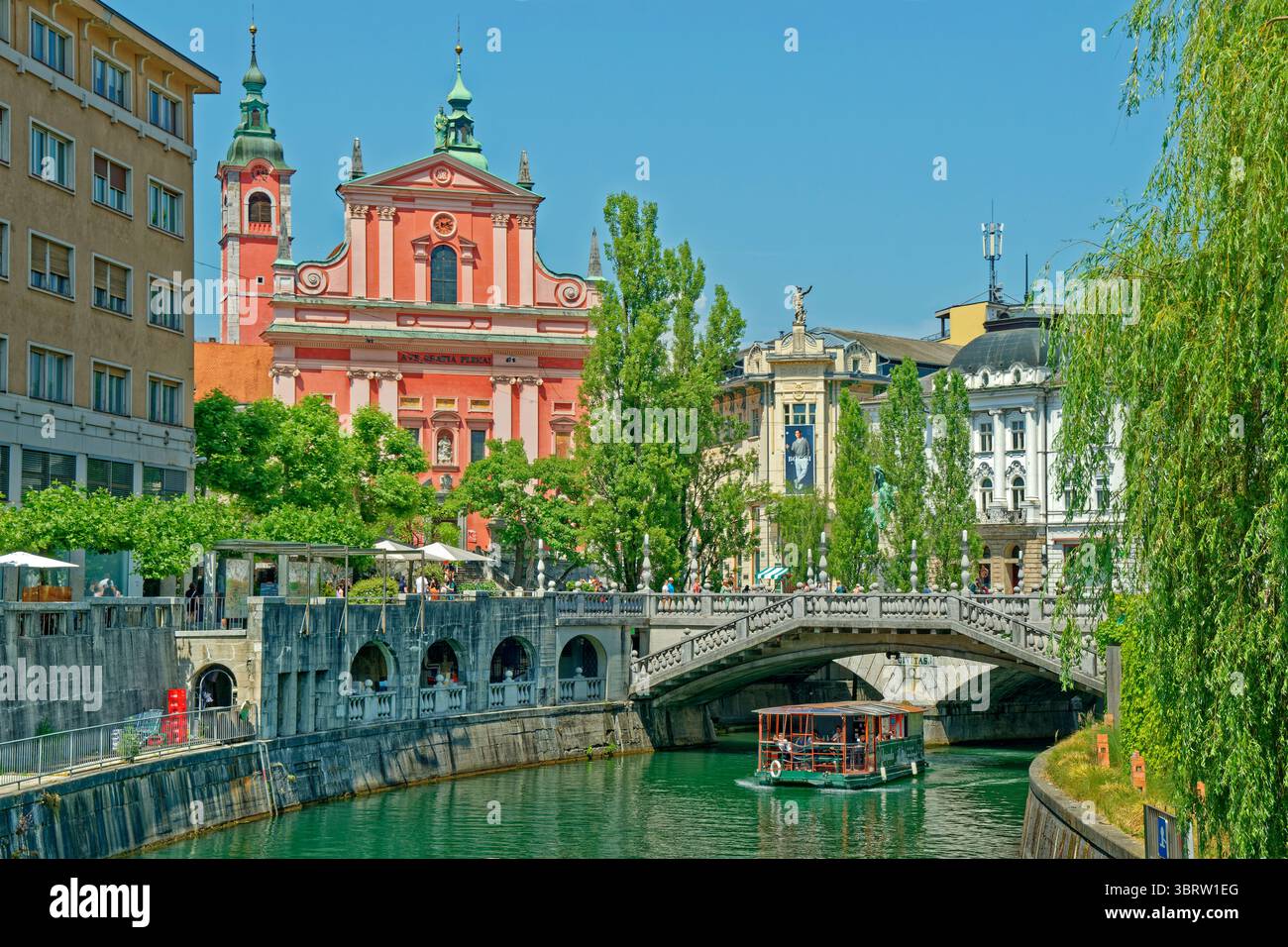 The Ljubljanica River in Ljubljana city centre, the capital of the state of Slovenia in the northern Balkans. Stock Photo