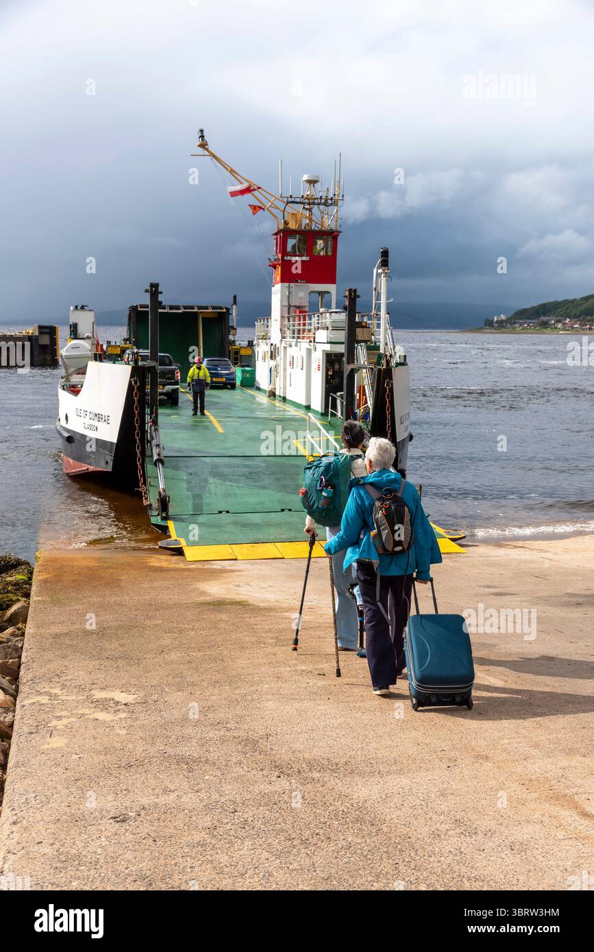 Largs Firth of Clyde North Ayrshire Scotland UK. 06.07.2025. Passengers boarding a ferry from Largs to Millport Great Cumbrae UK. Stock Photo