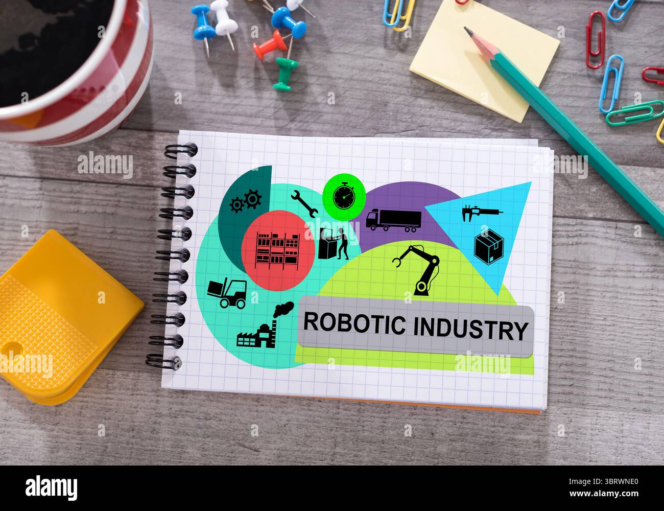 Robotic industry concept drawn on a notepad placed on a desk Stock Photo