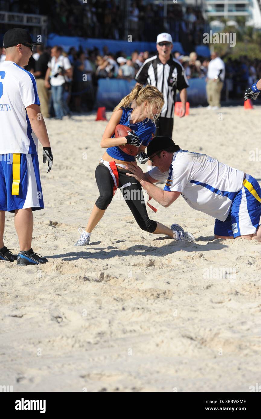 February 6, 2009, Miami Beach, Florida, United States Of America: MIAMI BEACH, FL - FEBRUARY 06: The Fourth Annual DIRECTV Celebrity Beach Bowl at DIRECTV Celebrity Beach Bowl Stadium: South Beach on February 6, 2010 in Miami Beach, Florida. ..People:  Marissa Miller, Tom Arnold  (Credit Image: © SMG via ZUMA Wire) Stock Photo