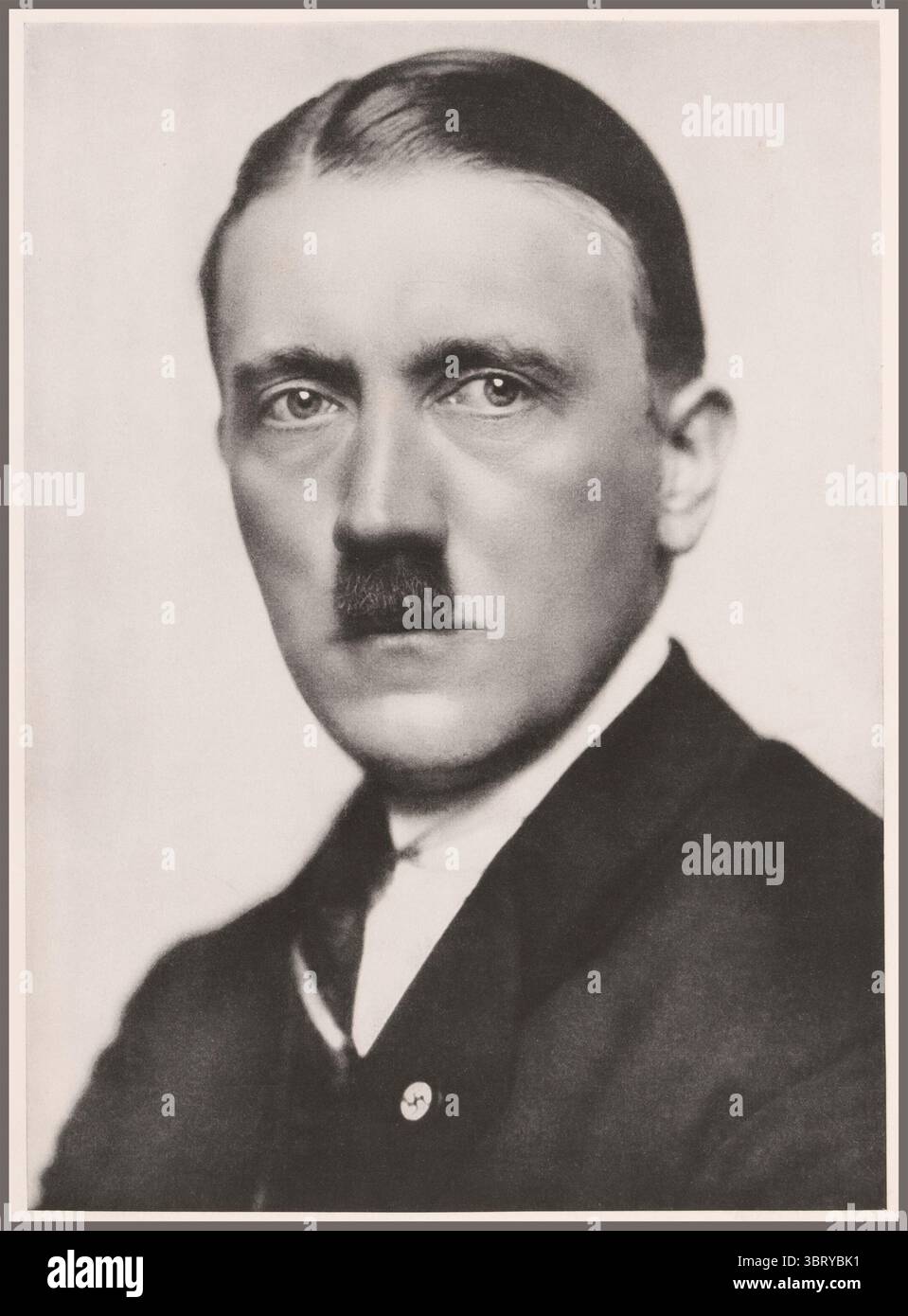 Adolf Hitler studio portrait in 1932, shortly before he became Chancellor of Germany (Reichskanzler) Adolf Hitler was an Austrian-born German politician who was the dictator of Nazi Germany from 1933 until his suicide in 1945. He rose to power as the leader of the Nazi Party, becoming the chancellor in 1933 and then taking the title of Führer und Reichskanzler in 1934. Nazi Germany Stock Photo