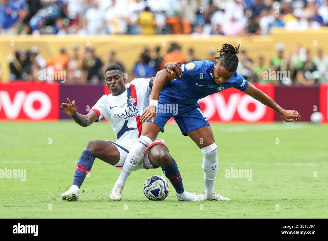 Christopher Nkunku of Chelsea and Nuno Mendes of Paris St. Germain