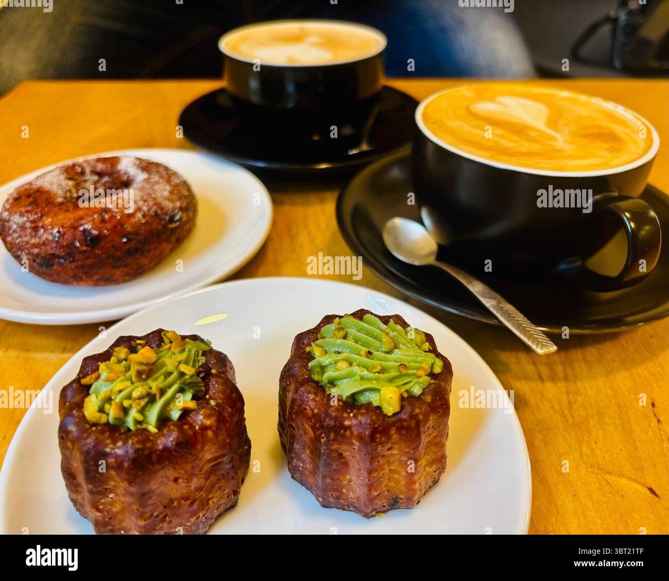 Coffee and tasty desserts at Kmyninė kepykla bakery and cafe in Vilnius, Lithuania. - Smartphone Captured Stock Image