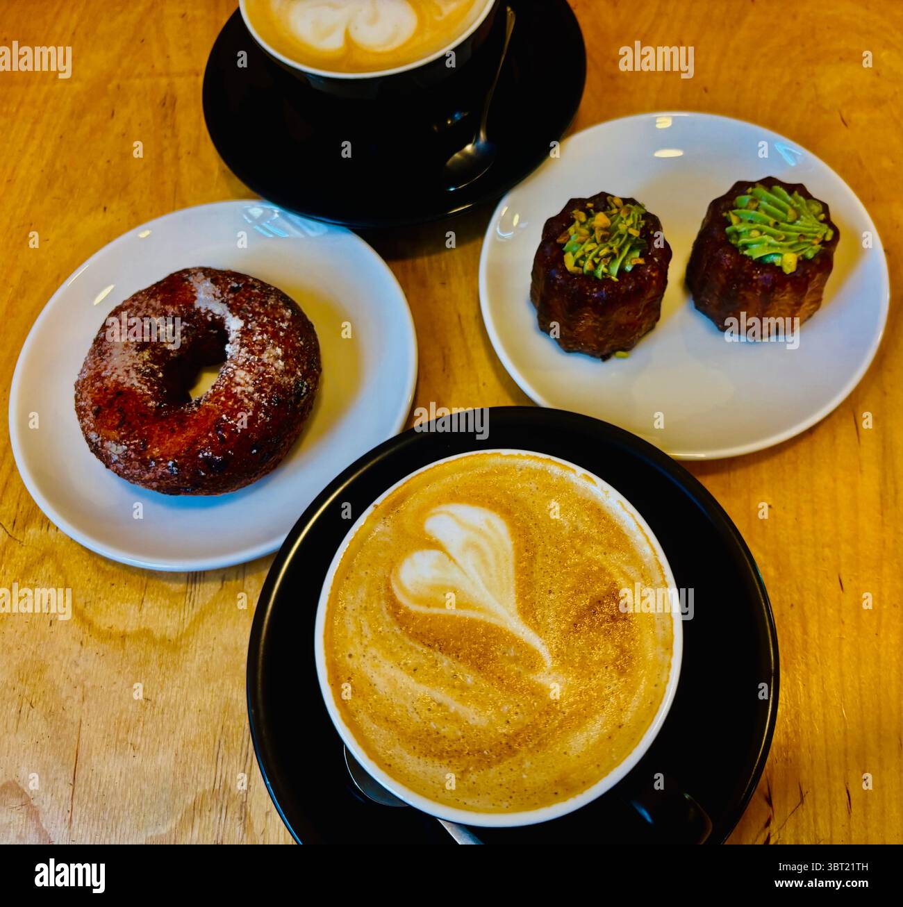 Coffee and tasty desserts at Kmyninė kepykla bakery and cafe in Vilnius, Lithuania. - Smartphone Captured Stock Image